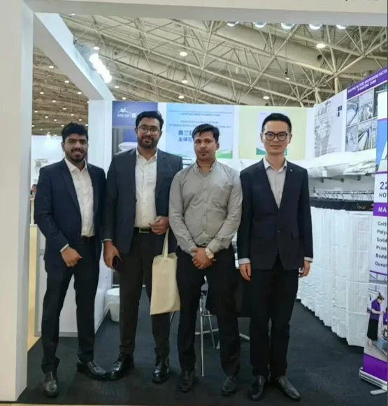 Funihe team and hospitality textile buyers at exhibition 4