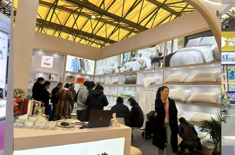 Funihe team and hospitality textile buyers at exhibition 6