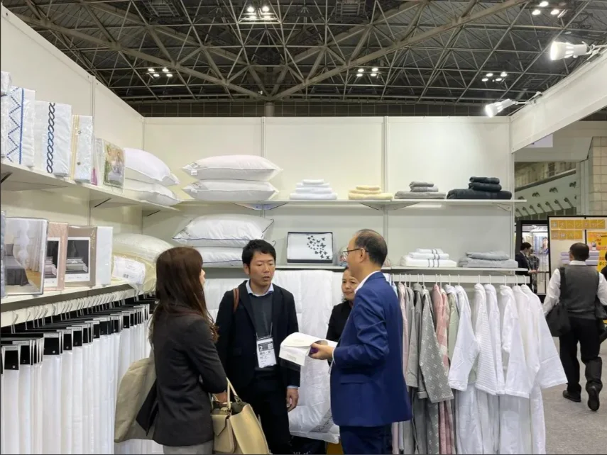 Funihe team and hospitality textile buyers at exhibition 7