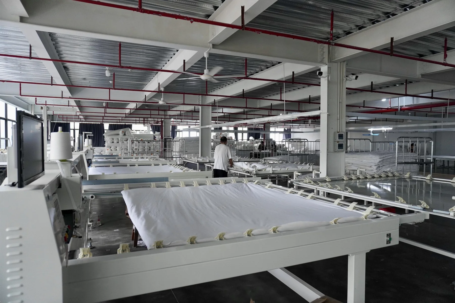 Close inspection of textile manufacturing material at Funihe